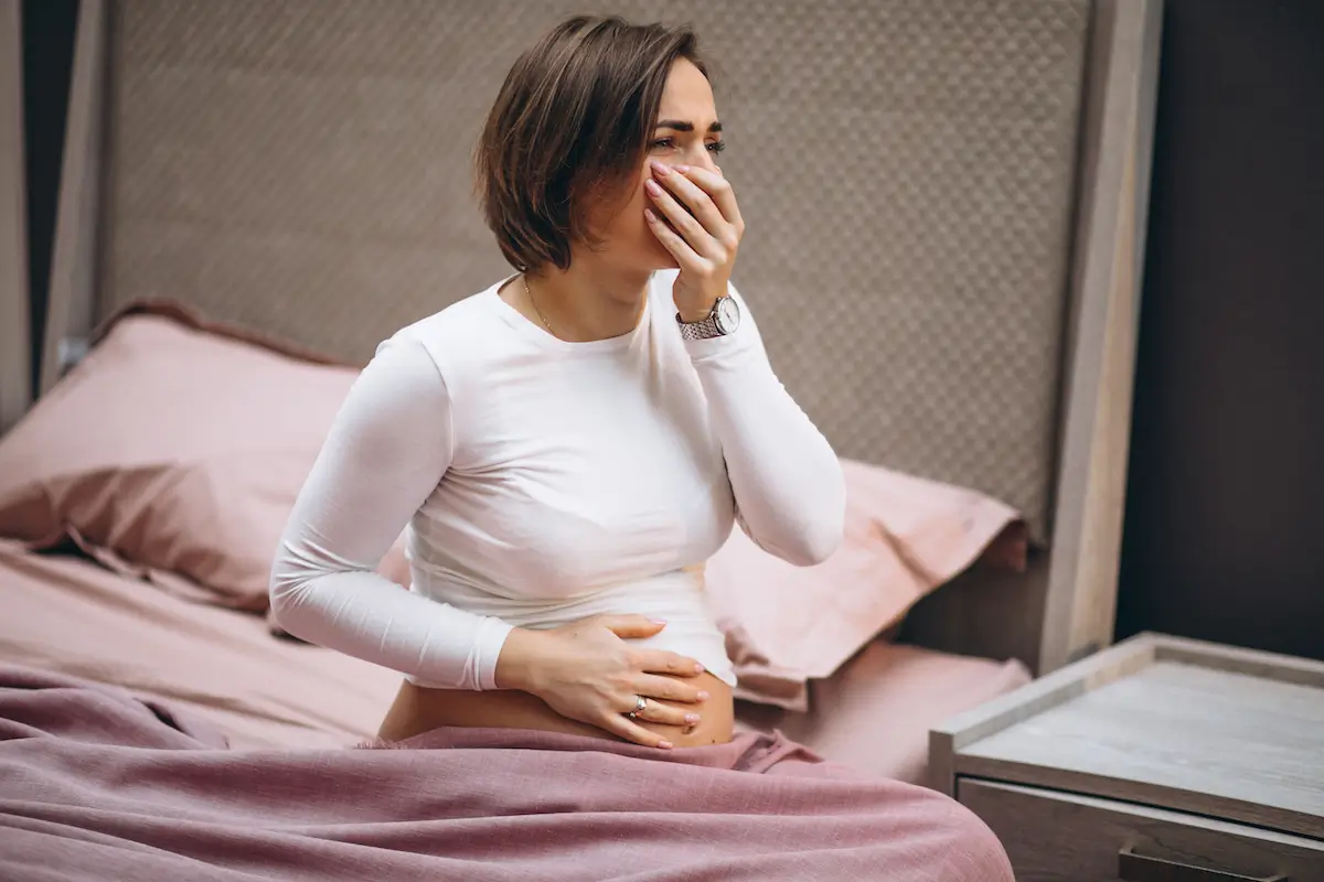 young-pregnant-woman-having-toxicosis-first-trimester.webp